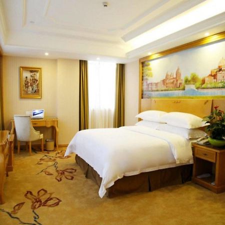 Vienna International Hotel Meizhou Spindle Bridge Branch Extérieur photo